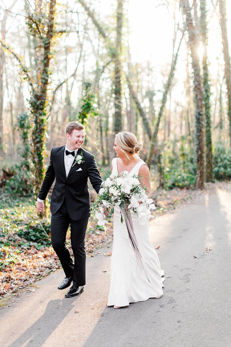 bride and groom holding handsby Knoxville Wedding Photographer, Amanda May Photos
