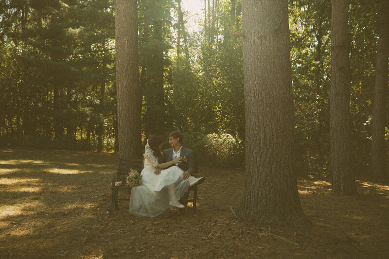 Bride and groom dancing in front of an old vintage church