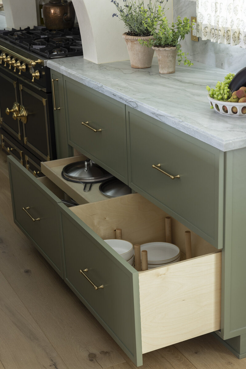 Tustin kitchen remodel with green skinny shaker cabinets and pull out drawers for pots and pans