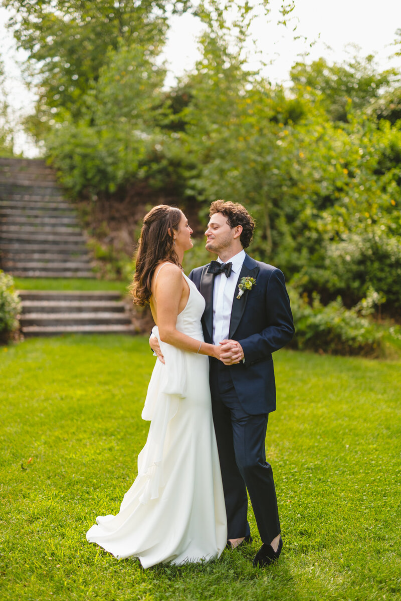 Couple dancing on grass, Unique Melody Events & Design (New England Wedding Planners) helped with this wedding