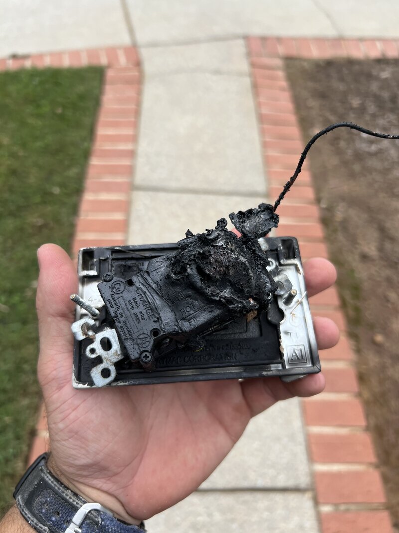 Burned Electrical Outlet replaced and fixed by Evergreen Electric