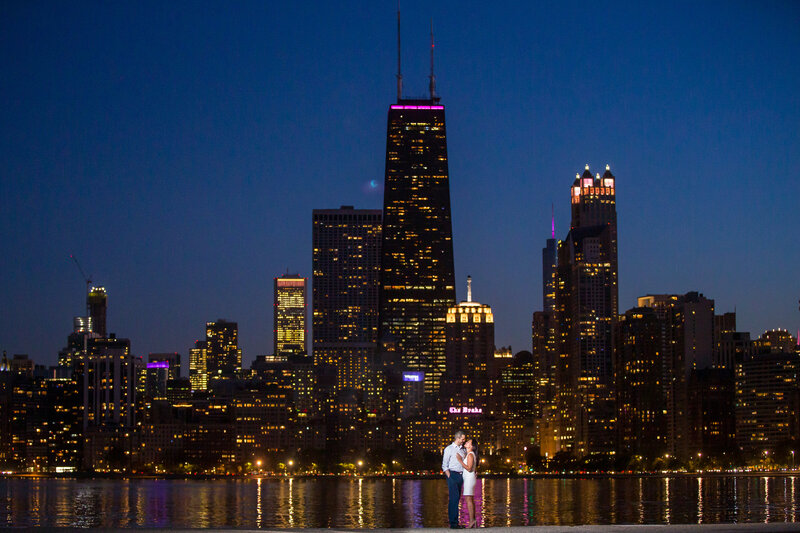 A breathtaking wedding photo of the Chicago skyline at night.
