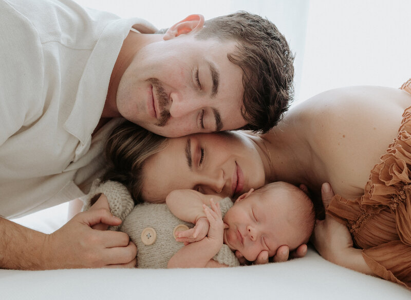 natural newborn photography capturing quiet moments during indoor session