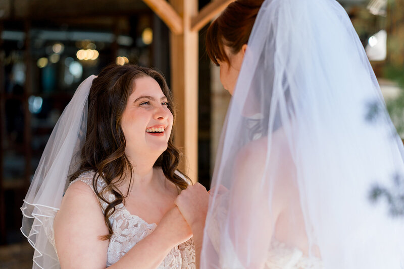 Editorial Photo of Jewish Couple in Chicago with ice cream and backed by bright yellow flowers in an elopement style jewish wedding