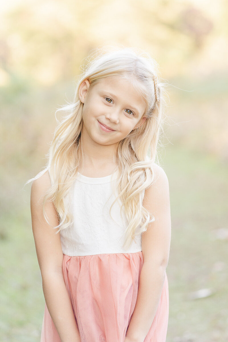 girl with a sweet smile during Gainesville, Virginia fall mini session