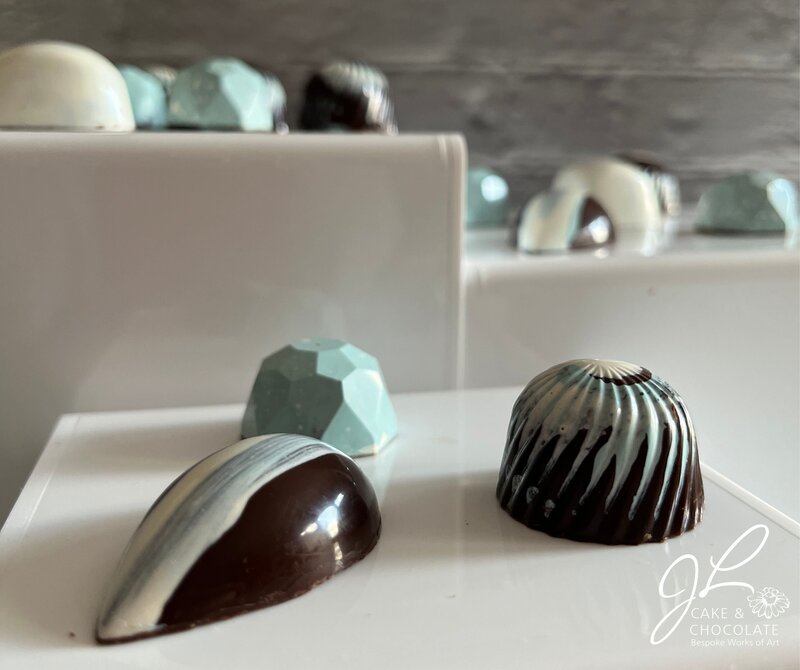 hand-painted luxury chocolate bonbons in tiffany blue