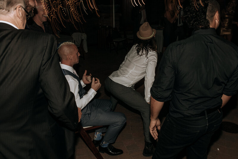 groom twerking with wedding guests