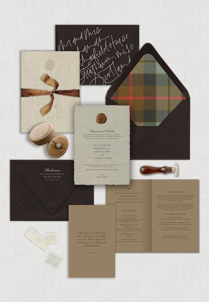 The invitation is letterpress printed on Putty colored handmade paper, a copper wax seal featuring a stag, a deep chocolate envelope with hand lettered guest addresses plus it includes a tartan envelope liner on felt paper, a folded rsvp and details card combo is printed on beach sand colored paper, wrapped in a Japanese textured paper, and finished with a copper velvet tie closure.