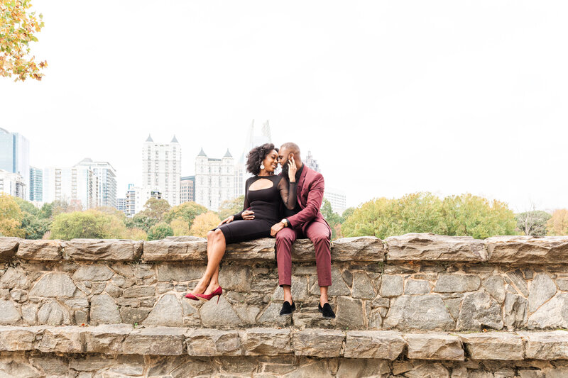 A black couple at their engagement session at Piedmont Park in Atlanta Georgia by Jennifer Marie Studios, top Atlanta wedding photographer.