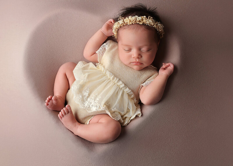 Newborn posing in gorgeous floral hoop swing digital  this denver newborn photography session