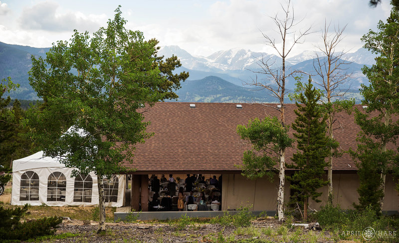 A wedding reception celebration during summer at Mountainside Pavilion at YMCA of the Rockies in Colorado