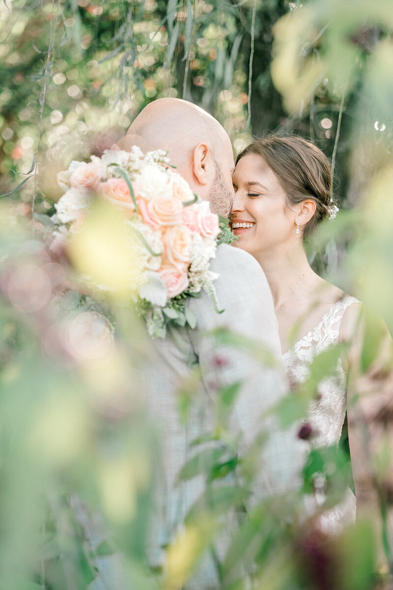 9 Oaks Farm Georgia Wedding | Outdoor Ceremony Kiss Romantic outdoor wedding ceremony at 9 Oaks Farm in Georgia with bride and groom sharing a kiss