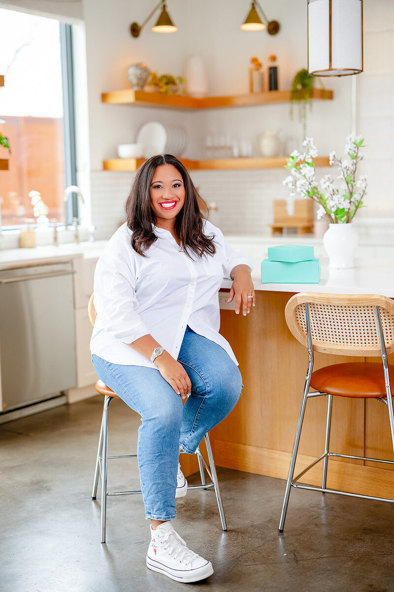 Marissa Allen in Home Bakery wearing white shirt and jeans