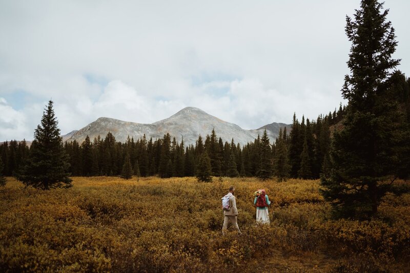 bride and groom hiking