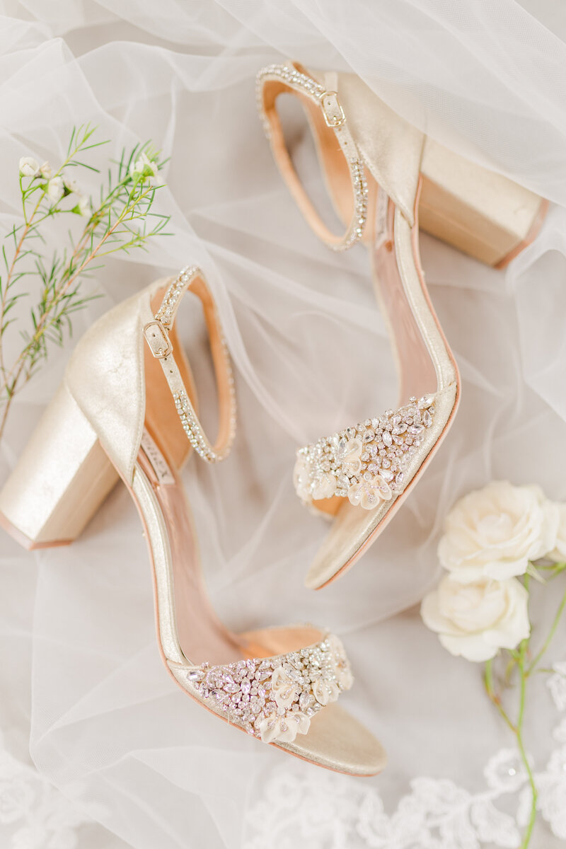 Detail photo of a bride's rose gold high heels for her Atlanta wedding by Jennifer Marie Studios