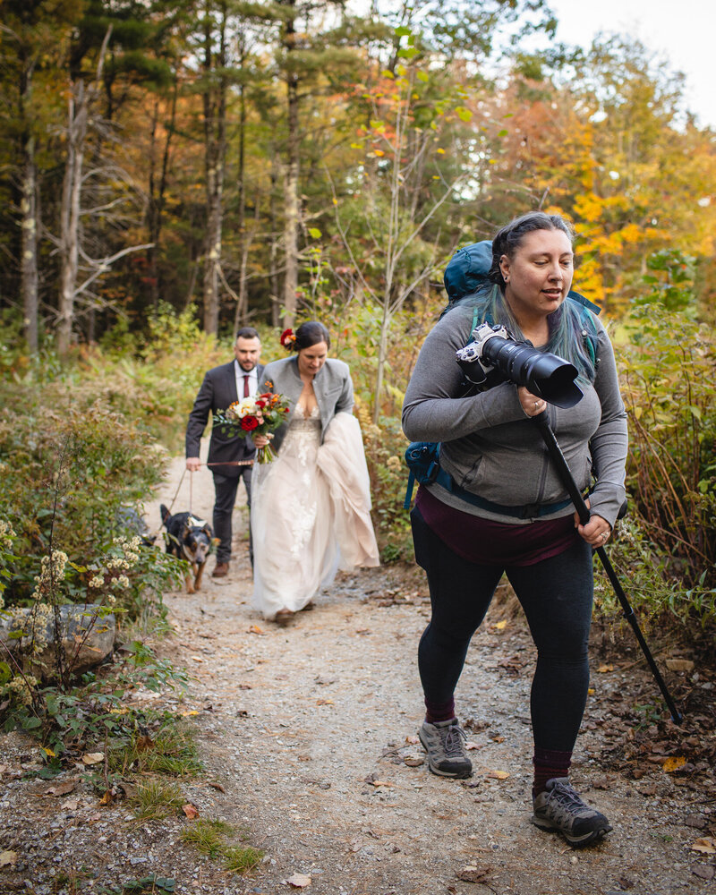 Emma Thurgood, New Hampshire Elopement Photographer hiking with clients