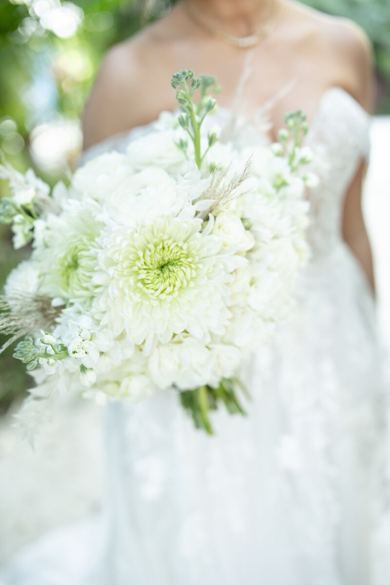 Bride holding white bridal bouquet in Islamorada Florida