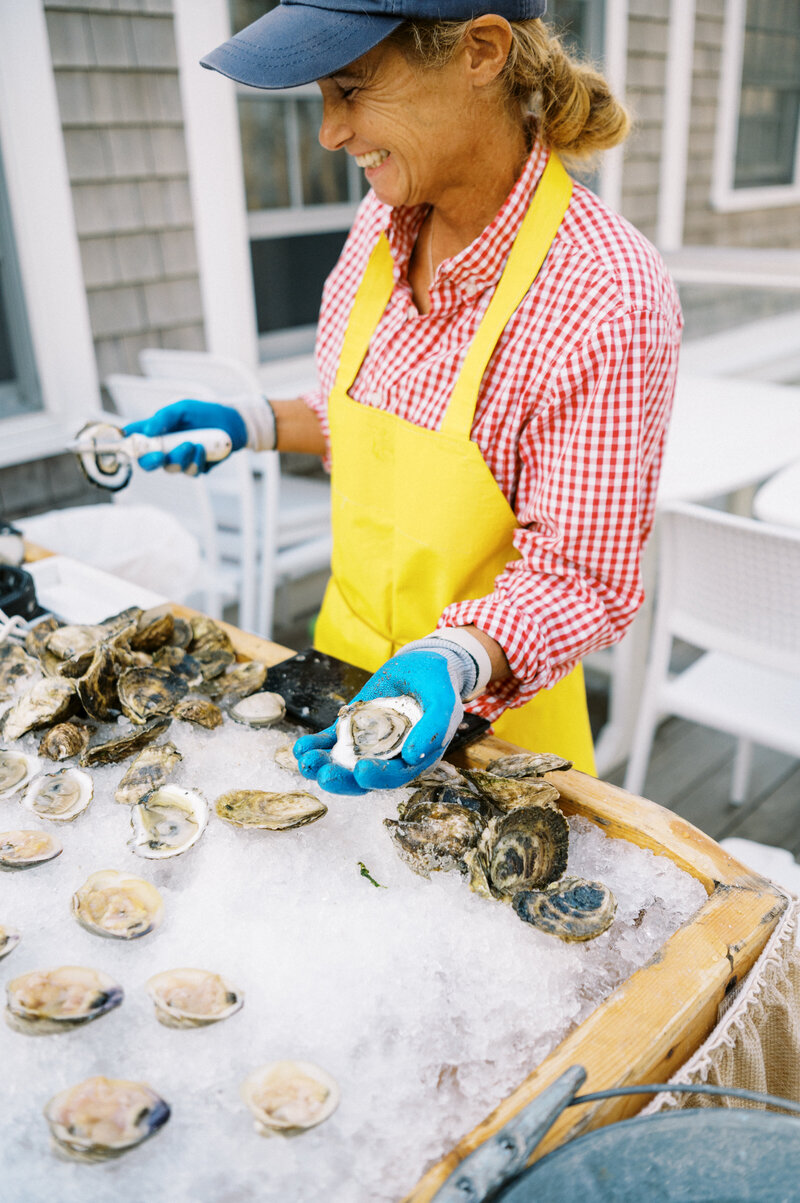fresh shucked oysters are served to guests at Chatham Beach and Tennis Club wedding