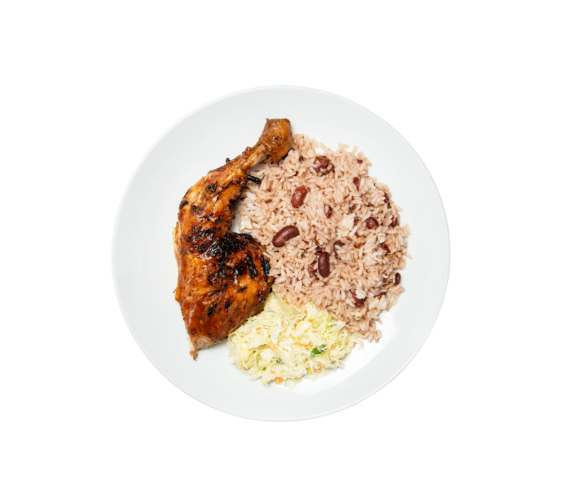 Jerk chicken leg, rice and beans, and coleslaw.