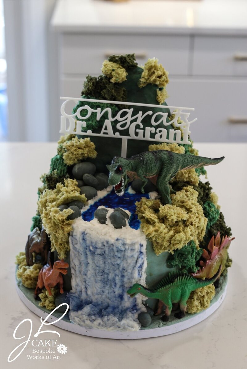 dinosaur cake with waterfall