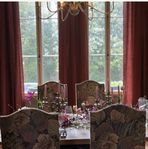 The dining room set for dinner at Chateau Charente.