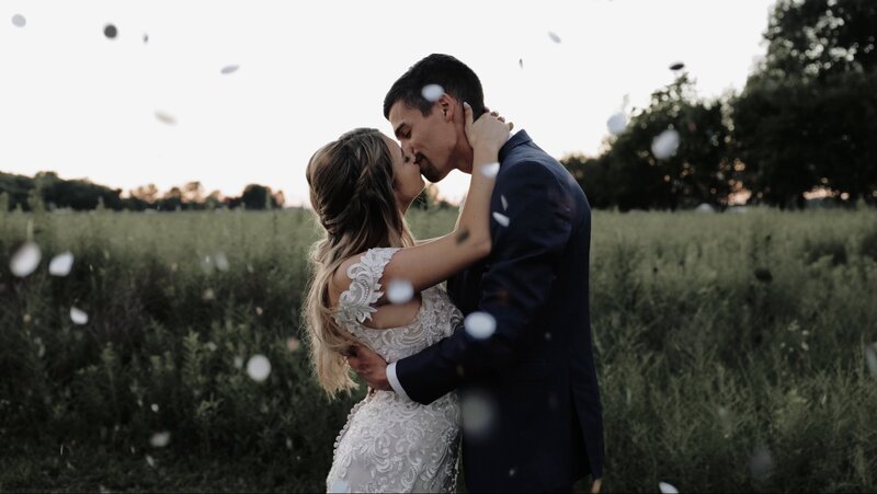 Couple kisses at a vineyard field outside Indianapolis