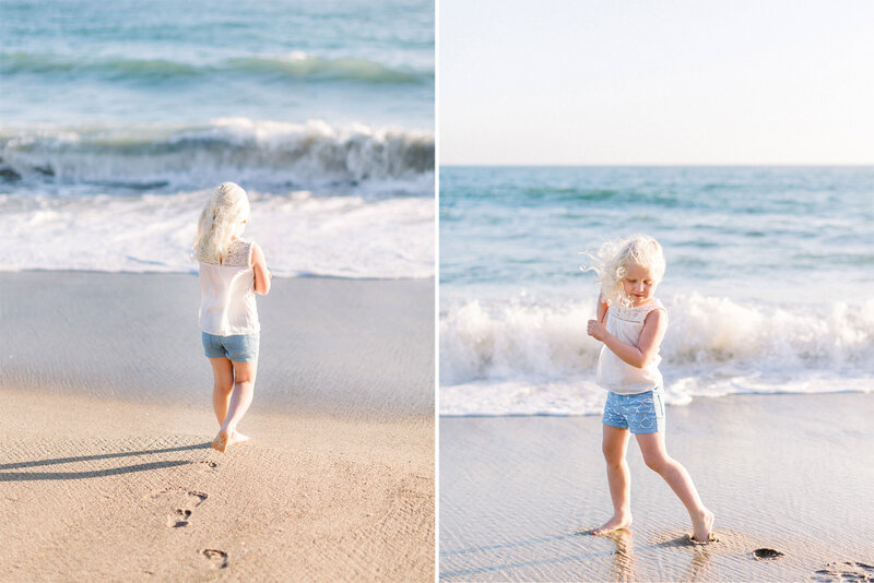 A blonde little girl making footsteps on the beach in Los Angeles during her child photography session with Daniele Rose
