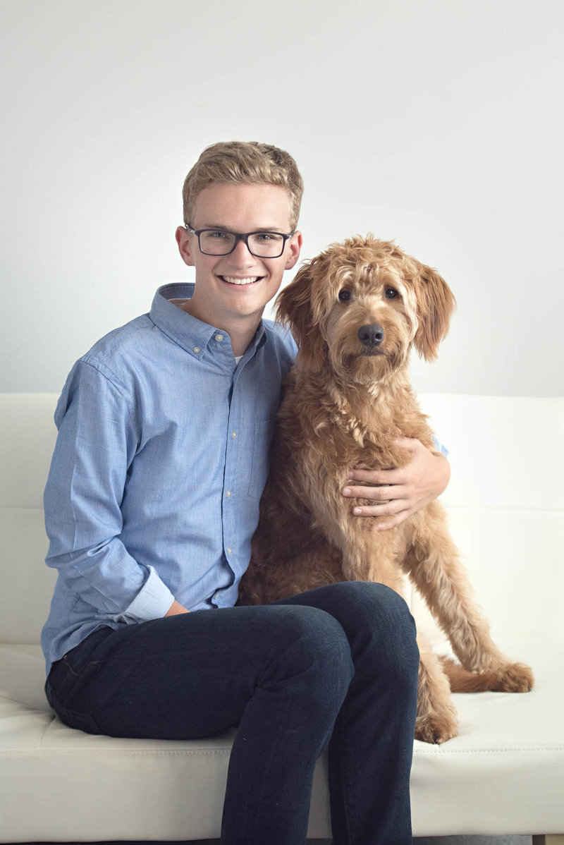 Guy senior picture with dog photographer St. paul