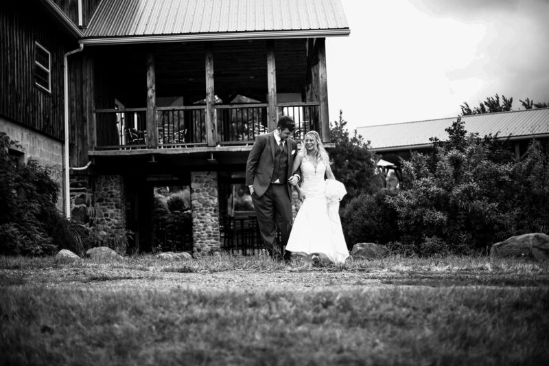 Bride and groom walk the grounds of Quincy Cellars before their wedding