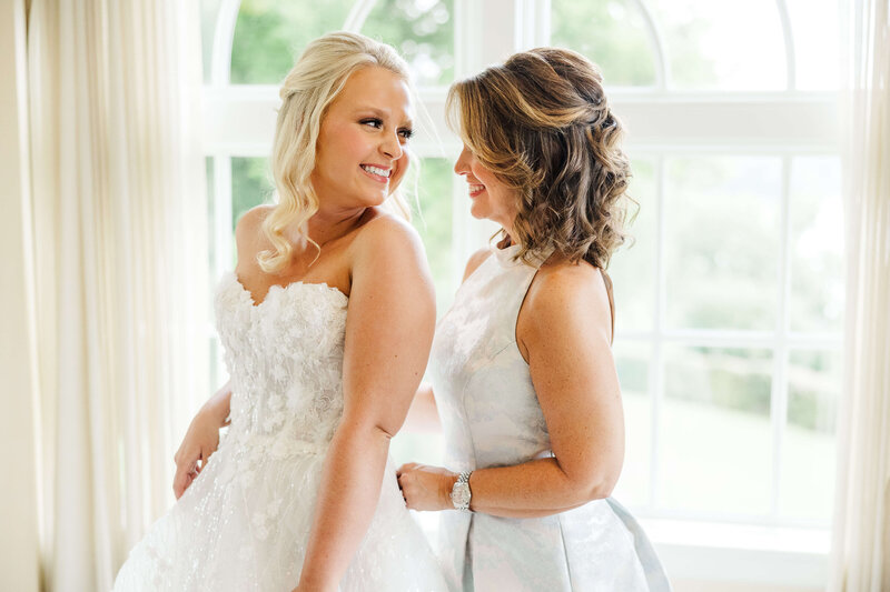 MOB helping bride get ready by knoxville wedding photographer amanda may photos