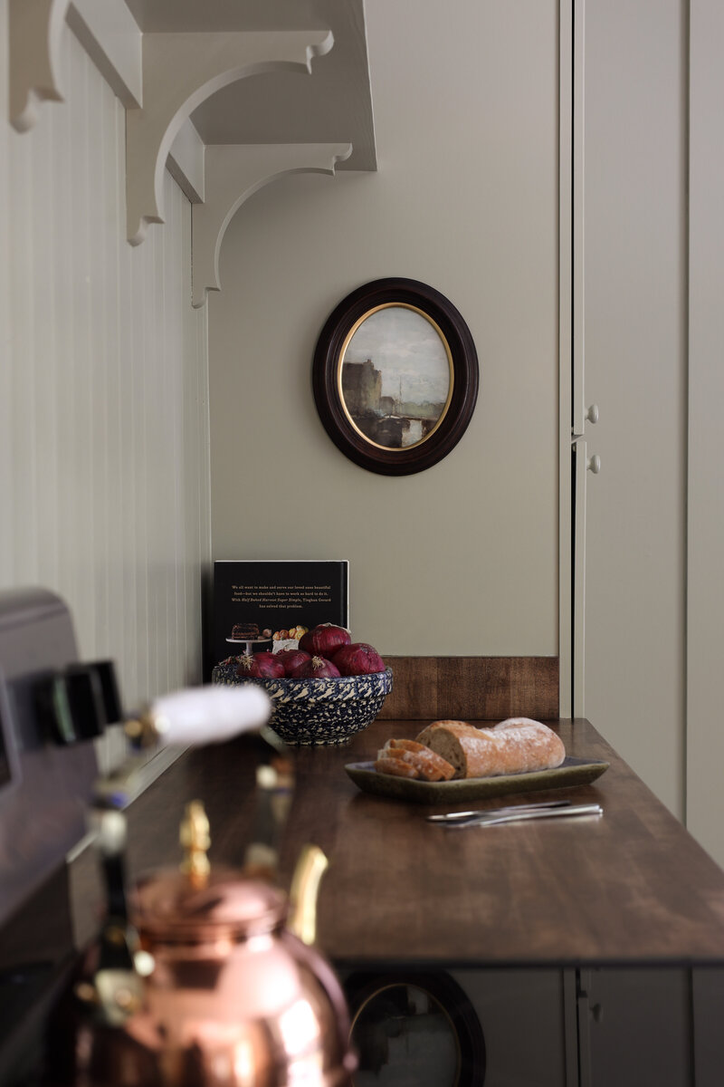 Moody Rustic Laundry Room renovation by Nadine Stay | Dark wood stained walls. Brown painted doors. DIY Ikea Pax hack. DIY mudroom built in cabinet. DIY shaker cabinet doors. DIY inset drawers. Basketweave brick floors.
