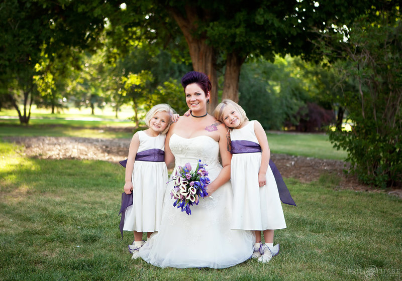 Punk rock bride with her flower girls on her City Park Wedding Day in Denver