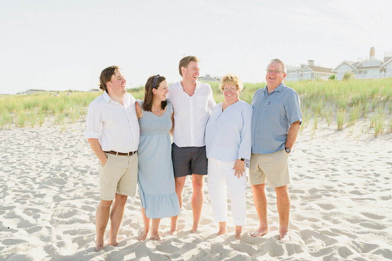 Elegant and candid extended family beach photos captured by a luxury photographer in Ocean City, NJ.