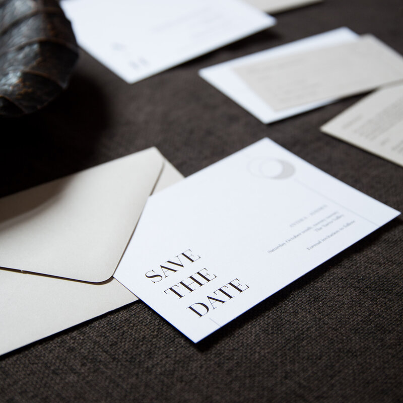 Natural  and elegant save the date card with stone coloured envelope
