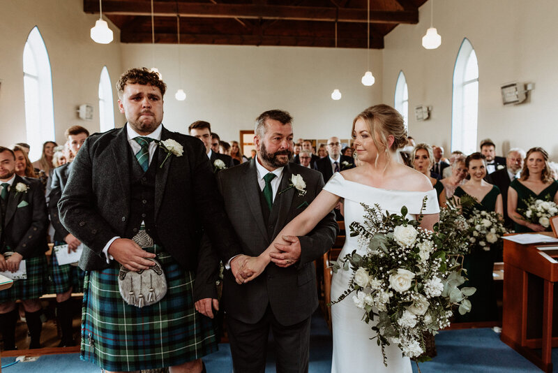 emotional bride and groom at ceremony