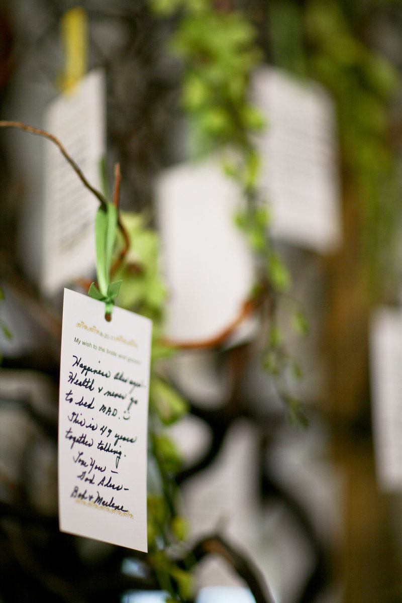 Written wedding notes on tree