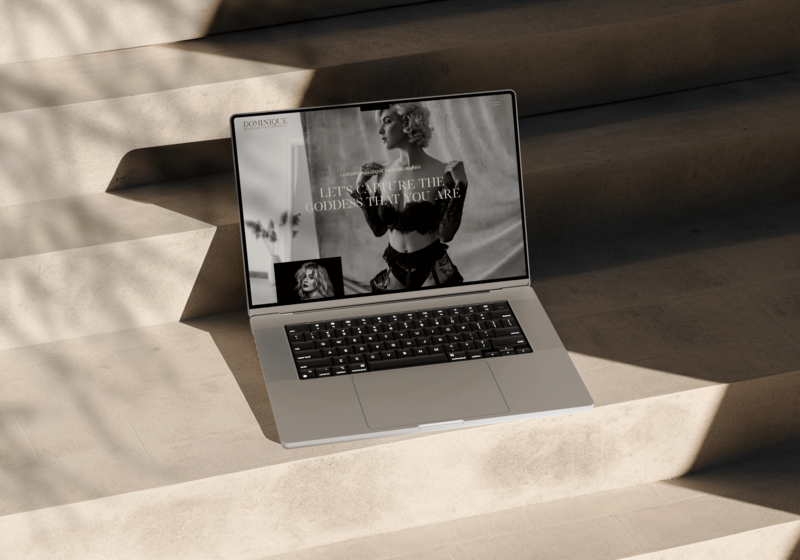 Dominique Showit website template for photographers with a luxurious, classy design—ideal for boudoir photography portfolios and attracting confident clients