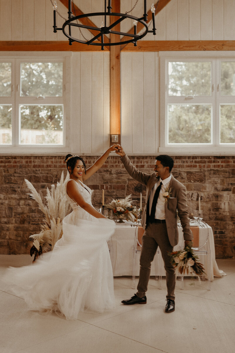 Fun-Loving Boho wedding bride and groom in Maryland barn venue