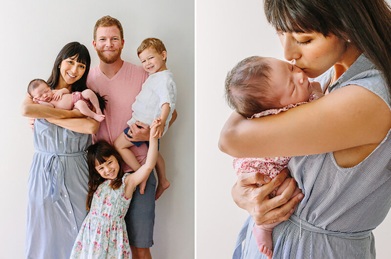 A family of five poses with their newborn baby sister