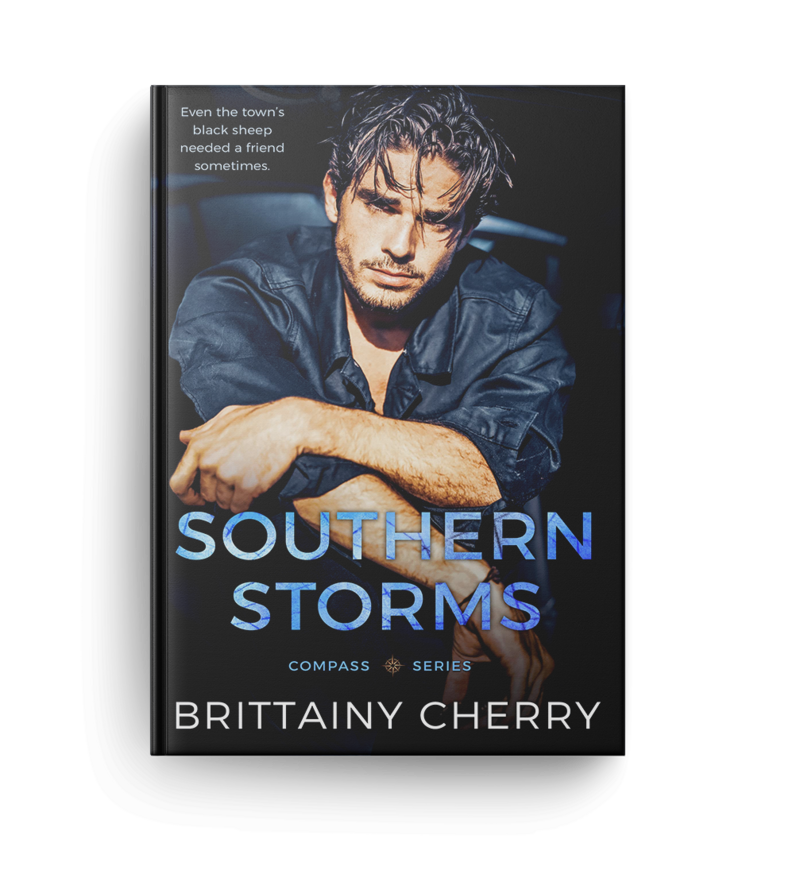 man in denim jacket folds arms while looking forward on the cover of romance novel  southern storms