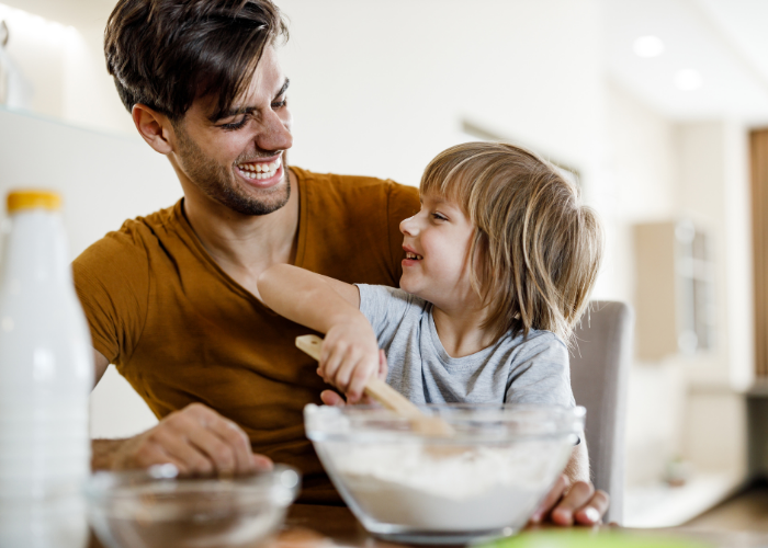Thrive by Spectrum Pediatrics image for Yummy Toddler Food article ultimate guide to picky eaters is a child and father preparing food for mealtime