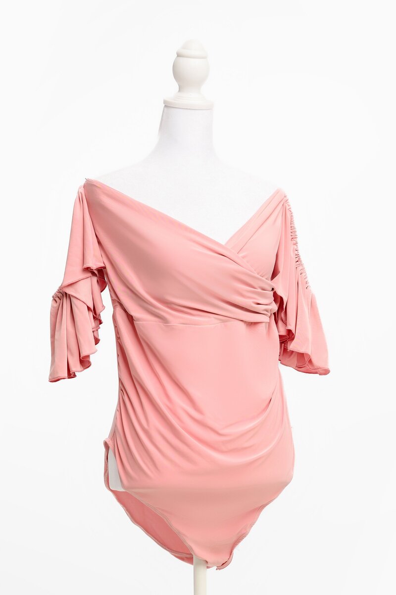 pink maternity bodysuit on a mannequin