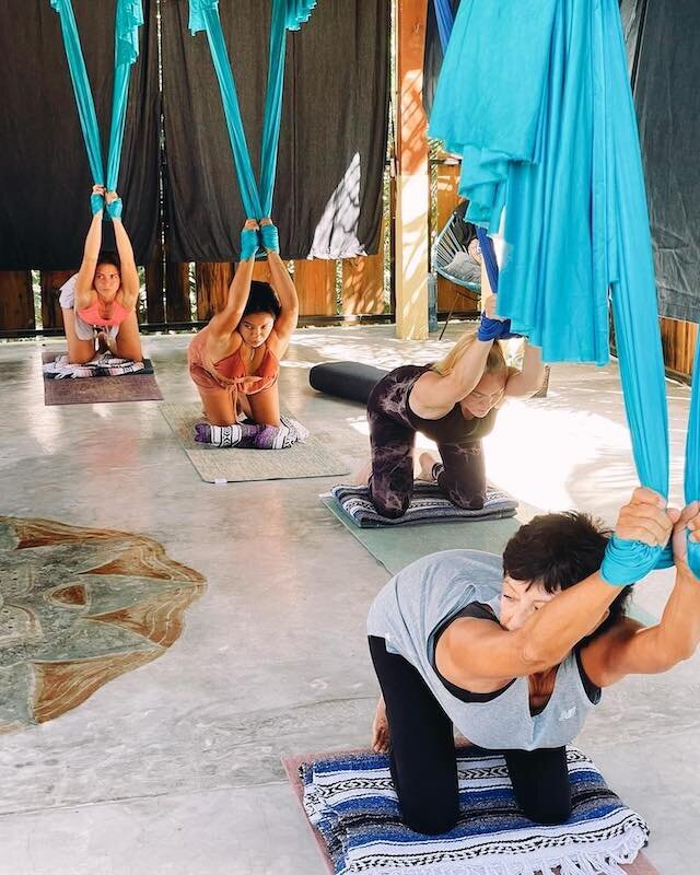 Marea Yoga Studio offering a range of daily classes like Hatha, Vinyasa, Kundalini, and Aerial Yoga, along with cacao ceremonies, sound healing, and in-depth masterclasses.