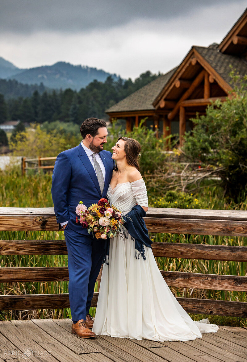 Beautiful Moody Wedding Day at Evergreen Lake House During Fall in Colorado