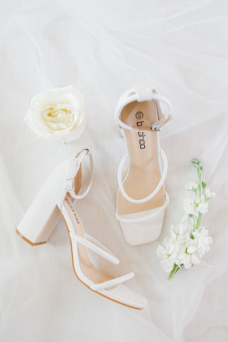 bridal shoes and florals for a wedding