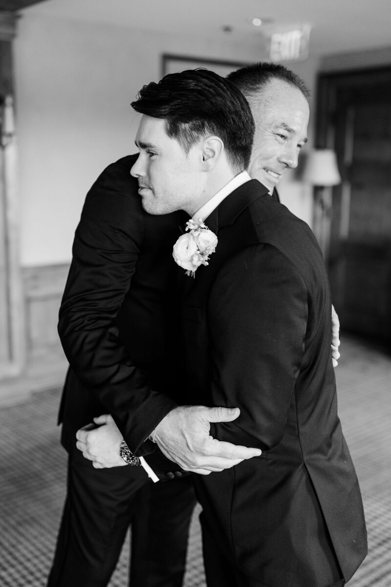 father and son hugging by knoxville wedding photographer amanda may photos
