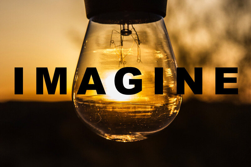 Horizontal branding image closeup of lightbulb in gold light with the word Imagine written across in black bold letters