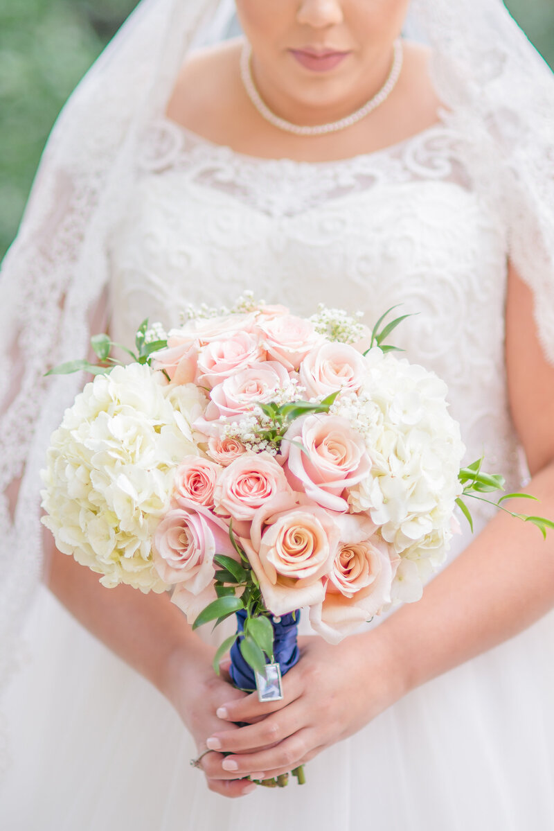 oft white and soft pink  bridal bouquet photographed by Austin Tx Wedding Photographer Lydia Teague