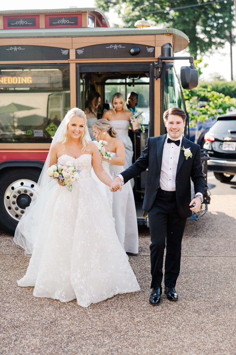 bride and groom getting off knoxville trolley
