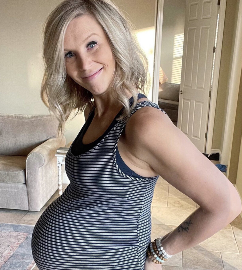 Leslie Burris showing off her baby bump